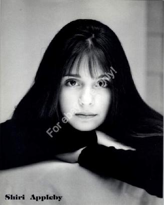 even in B W she reminds me of Emma Watson from HP I think it's the eyes